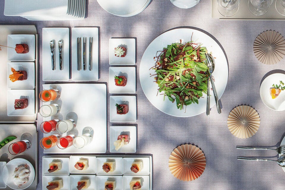 How to set up a buffet table Rosenthal Mesh White square plates and platters with small appetizers on a buffet table