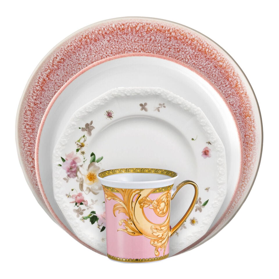 Various dishes stacked in front of each other