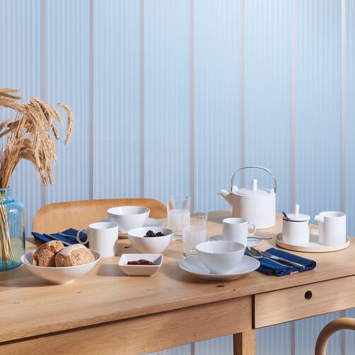 Thomas dinnerware Thomas by Rosenthal collection items on a wooden table