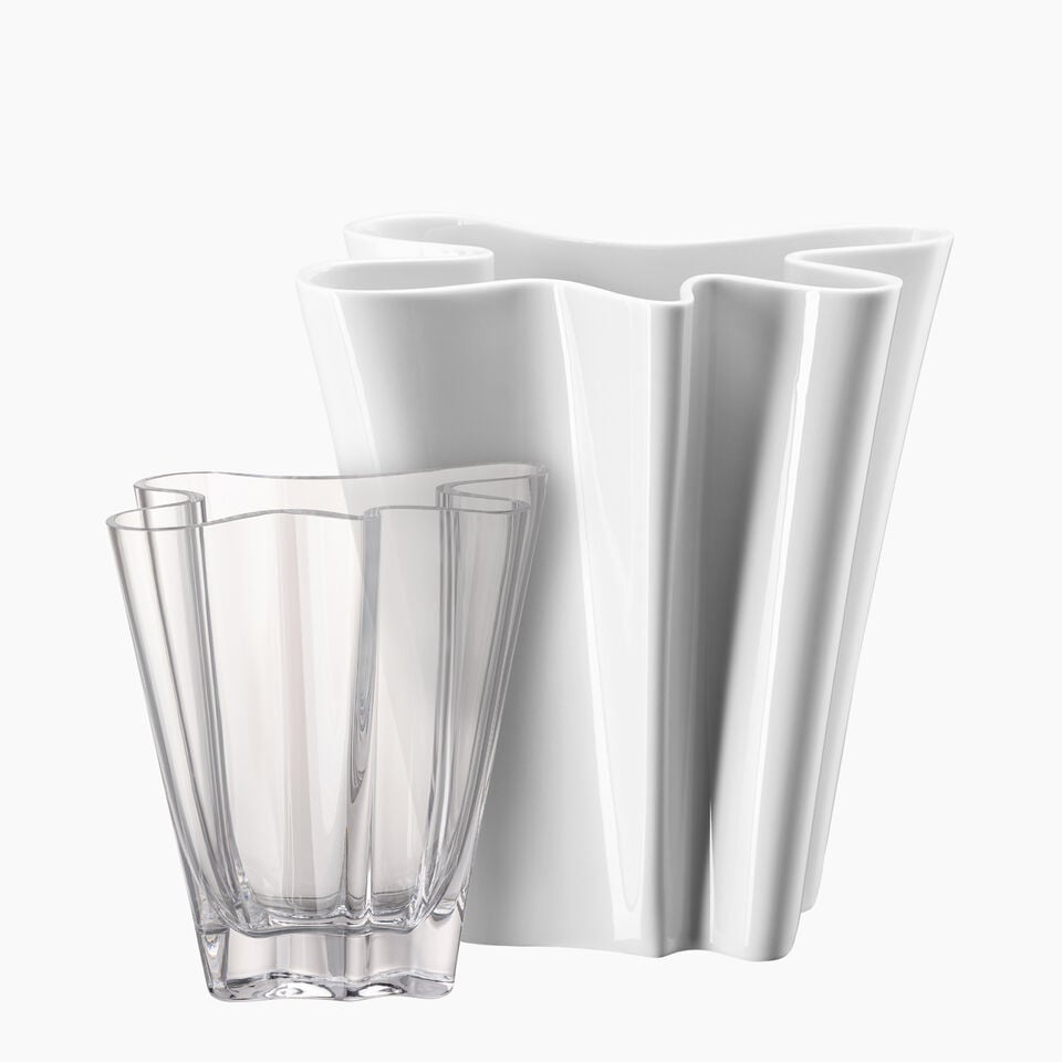 Rosenthal crystal and porcelain Flux vases on white background