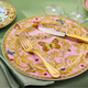 Rosenthal Versace Christmas tableware with festive red decorations