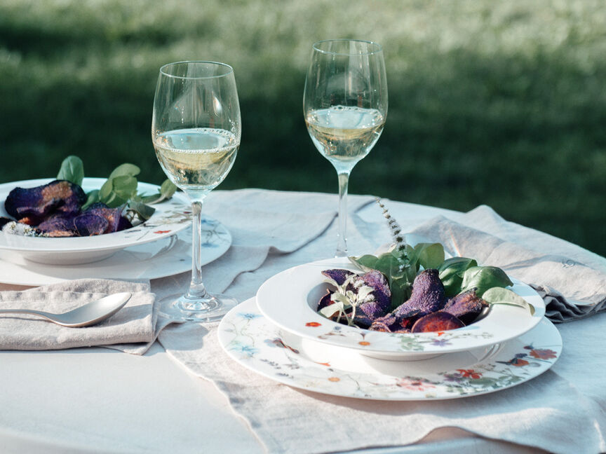 Wedding table set with Rosenthal Bone China Brillance tableware in a garden atmosphere