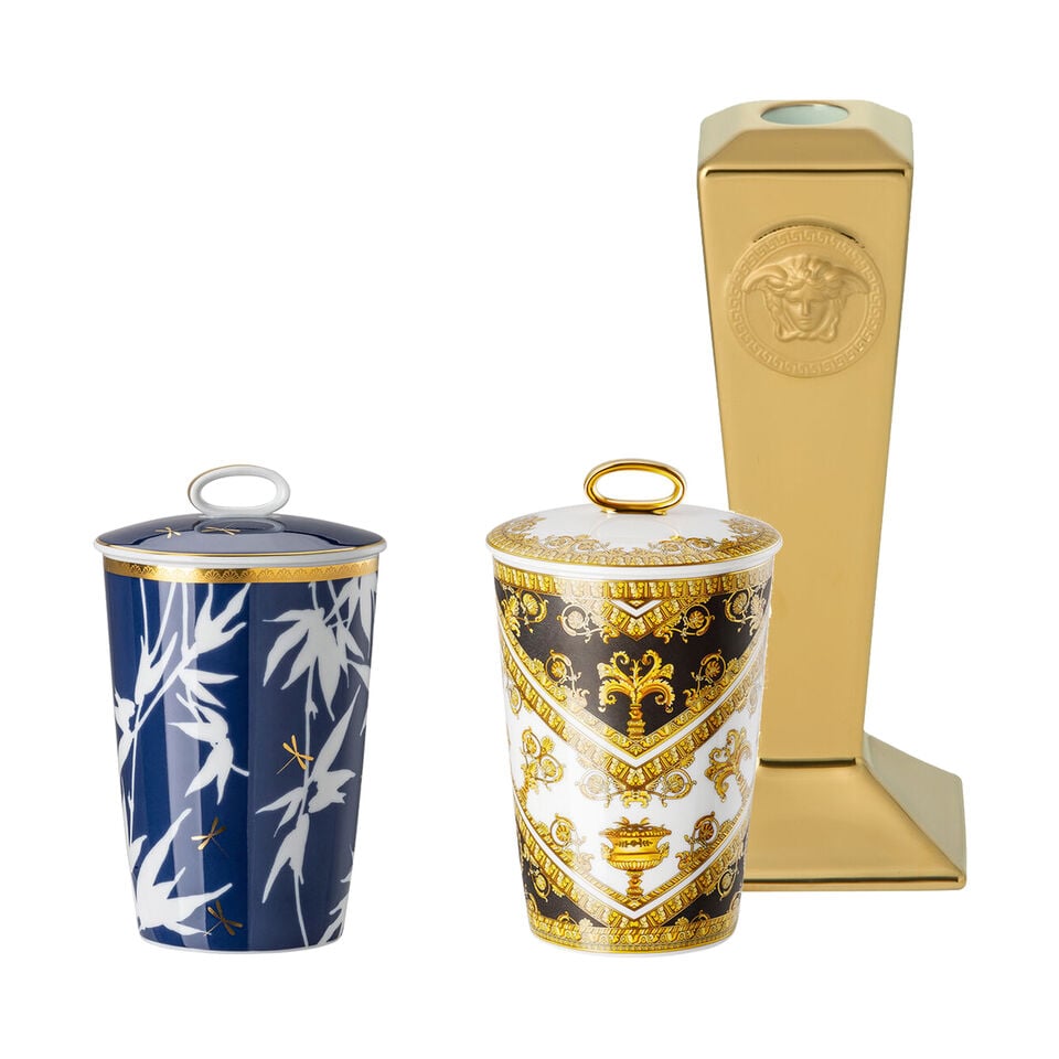 Rosenthal Free Spirit White three arm candle holder on off white background.