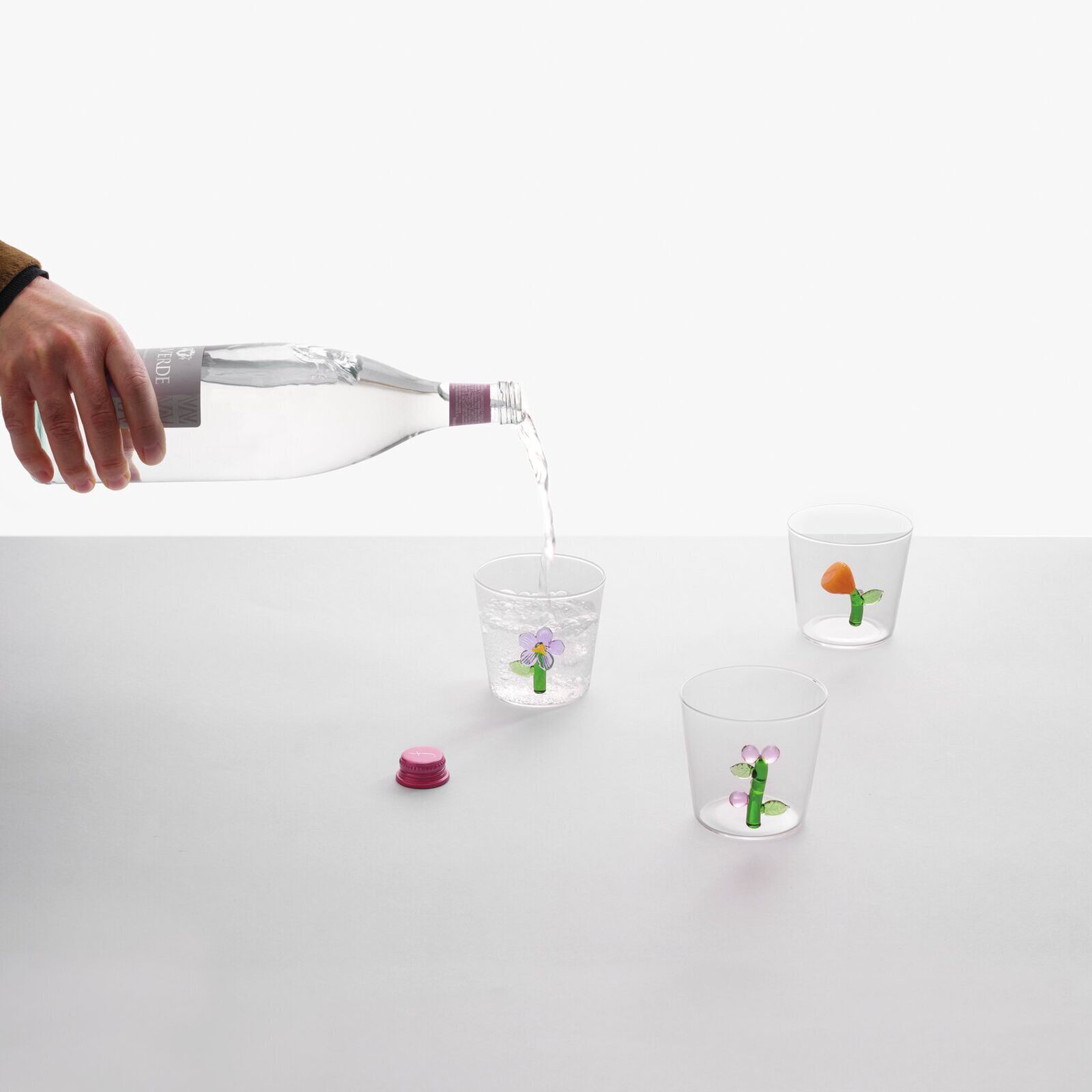 Water glass with pink flower image number null