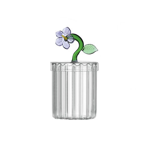 Container optic with lid and lilac flower