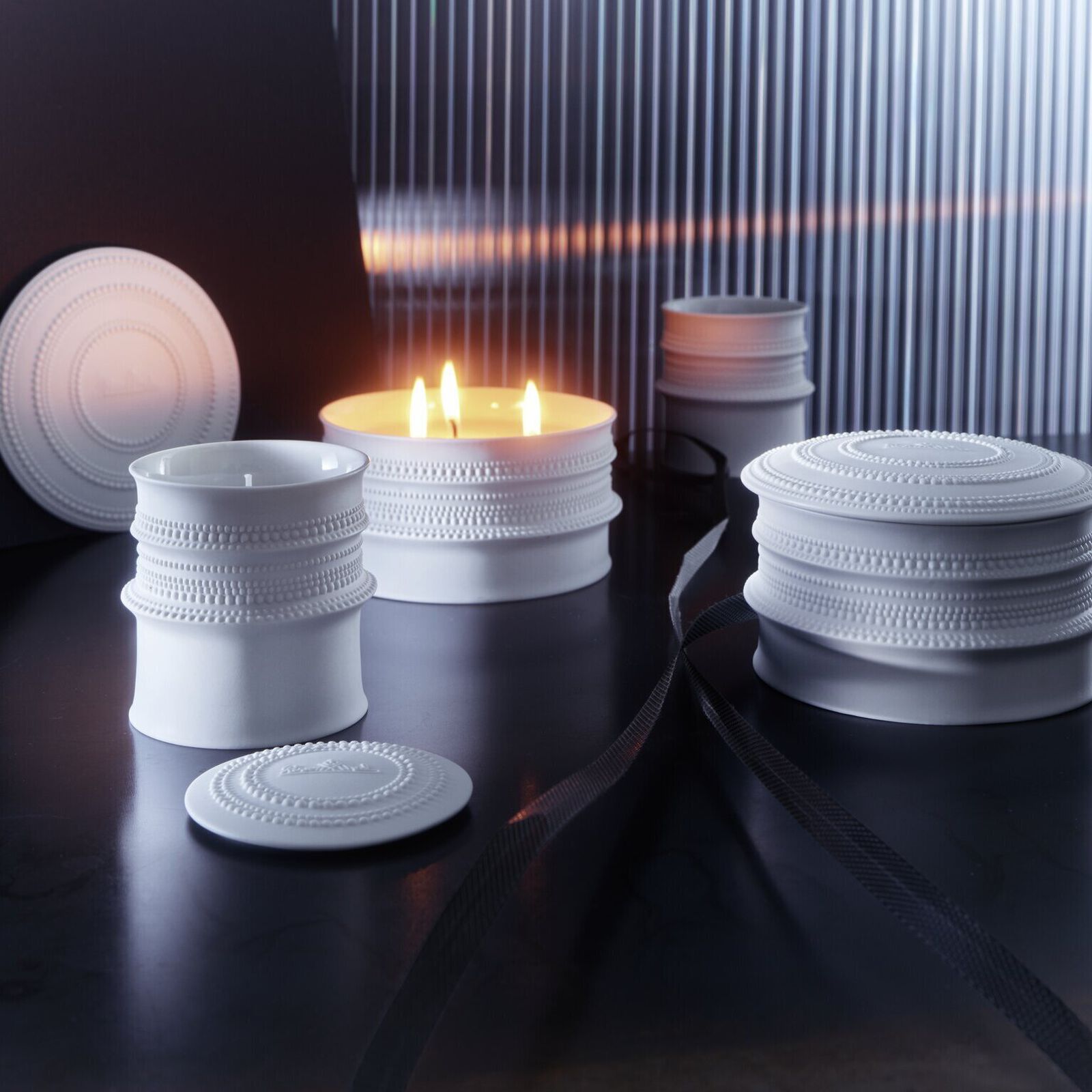 Small scented candle (2-piece) from the Rosenthal Pisara collection, cylindrical shape, dimensions 8.8 cm x 9.5 cm. image number null