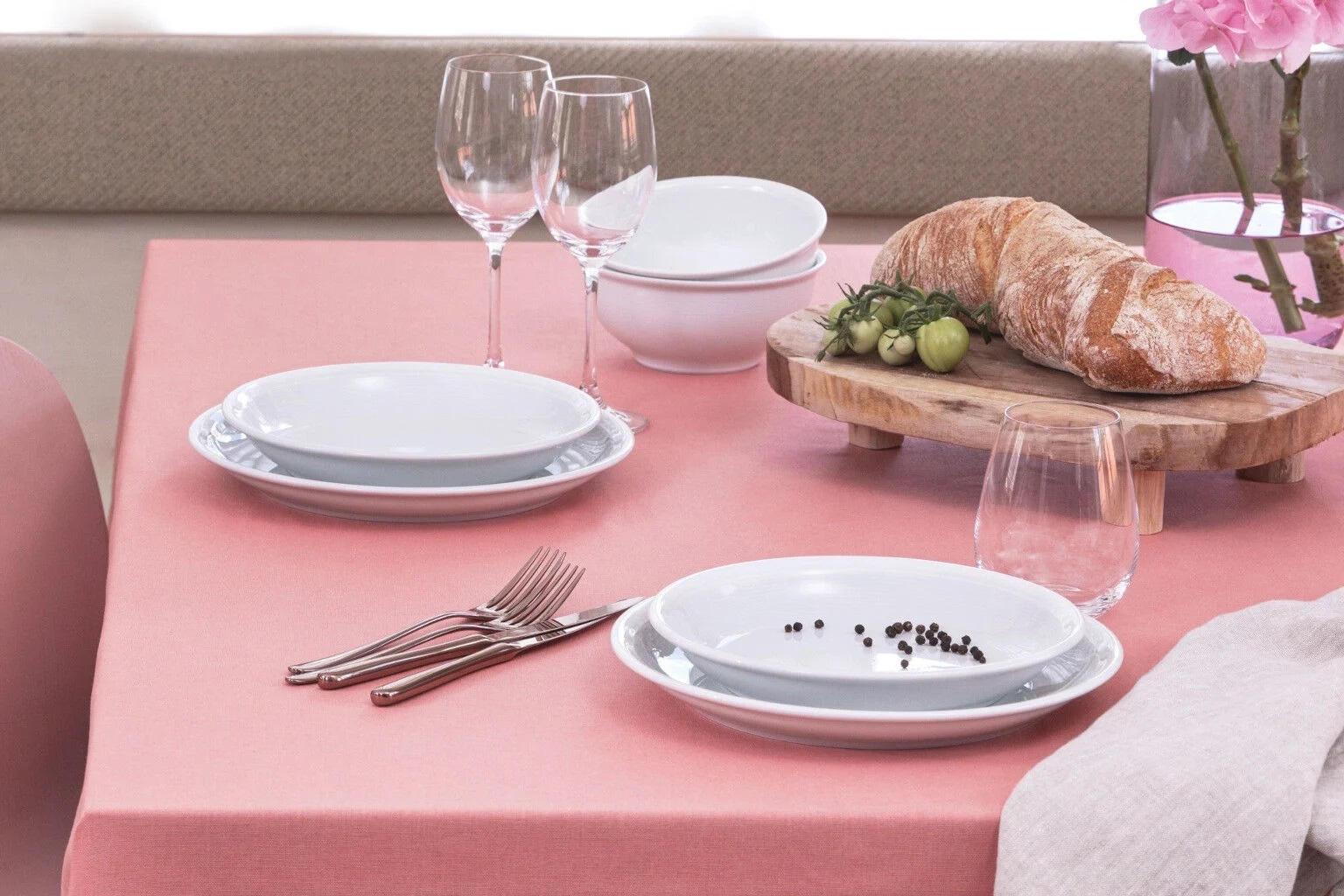 Thomas Trend White plates set on a light pink table cloth