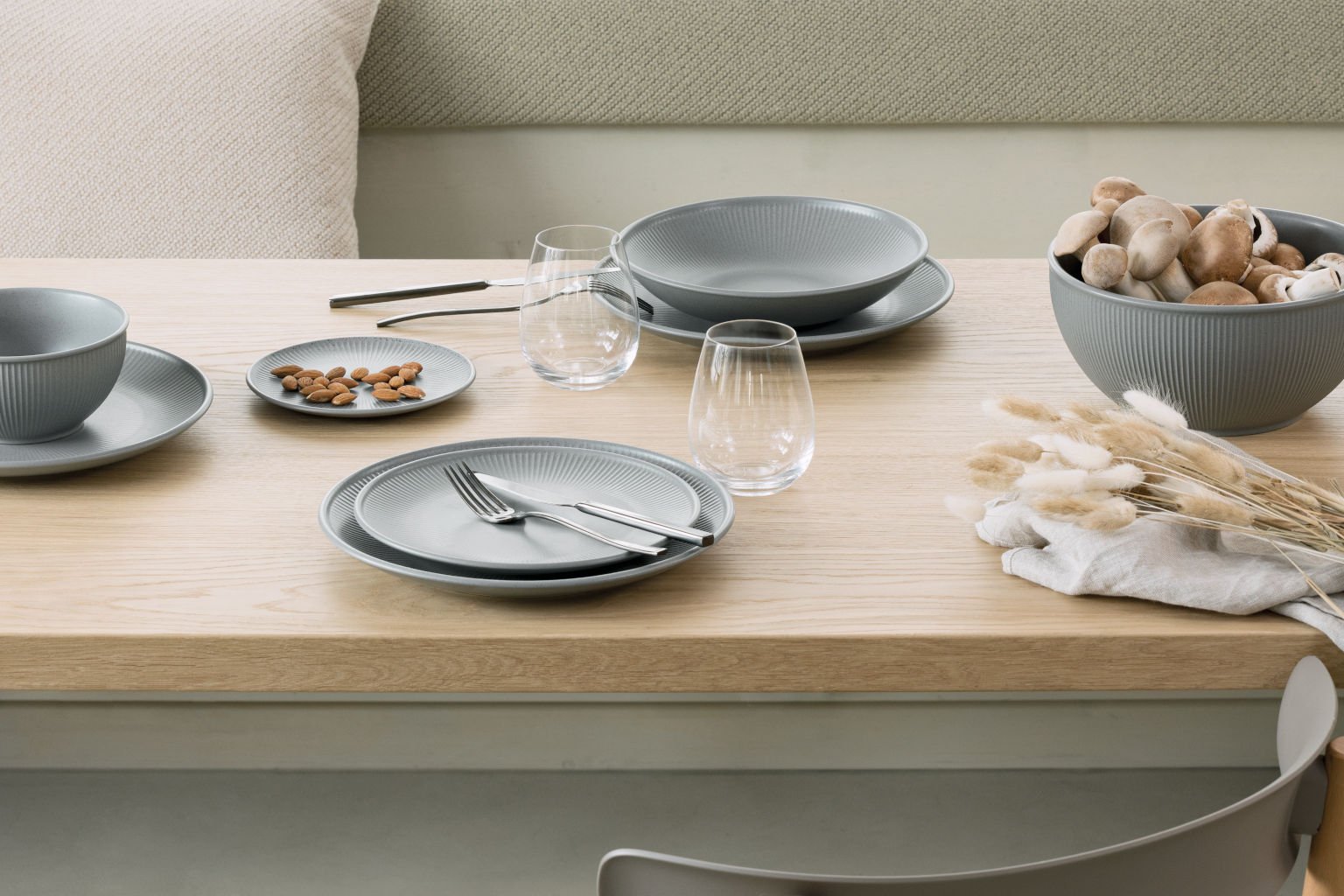 Table set with gray-colored Thomas Clay Smoke items