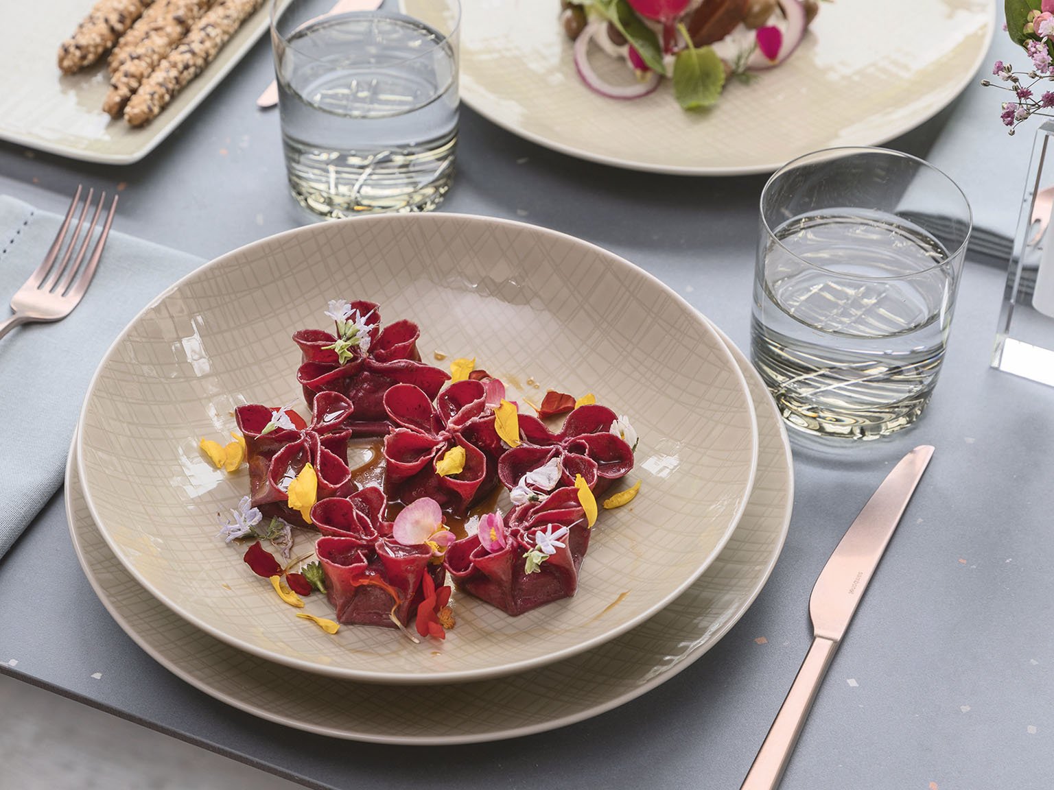 Rosenthal Mesh Cream plate with red-colored pasta