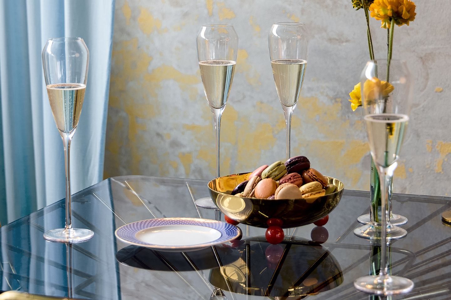 Rosenthal TAC champagne flutes on a glass table