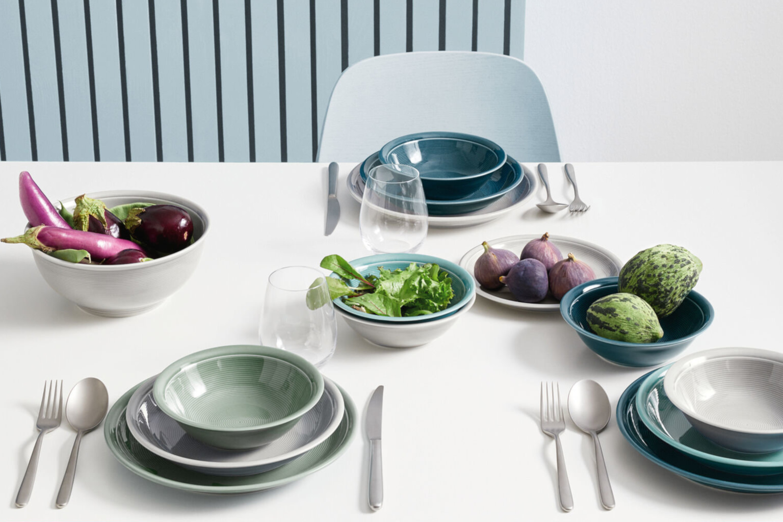 Table set with Thomas Trend Color items decorated with different vegetables